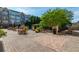 Serene outdoor patio with elegant brickwork and cozy seating arrangements for residents at 225 E Ponce De Leon Ave # 317, Decatur, GA 30030