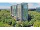A captivating full shot of the high-rise building, embraced by lush greenery at 3300 Windy Ridge Se Pkwy # 612, Atlanta, GA 30339