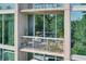 Exterior view showcasing the balcony, offering a serene outdoor space and greenery views at 3300 Windy Ridge Se Pkwy # 612, Atlanta, GA 30339