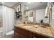 Bathroom with granite countertop, dark wood cabinets, and a shower-tub combination with a white shower curtain at 3300 Windy Ridge Se Pkwy # 612, Atlanta, GA 30339