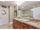 Dual vanity bathroom featuring granite countertops and modern fixtures, offering a luxurious and functional space at 3300 Windy Ridge Se Pkwy # 612, Atlanta, GA 30339