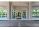 Exterior of building showcasing well-maintained entrance with elegant doors and manicured landscaping at 3300 Windy Ridge Se Pkwy # 612, Atlanta, GA 30339