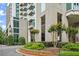 Apartment building featuring well maintained landscaping with tree and shrubbery at 3300 Windy Ridge Se Pkwy # 612, Atlanta, GA 30339