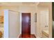 Hallway entrance with storage space and hardwood floors leading into a bedroom at 3300 Windy Ridge Se Pkwy # 612, Atlanta, GA 30339