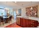 Modern kitchen with stainless steel appliances, a countertop island, and adjoining dining and living areas at 3300 Windy Ridge Se Pkwy # 612, Atlanta, GA 30339