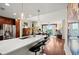 Open kitchen features a white quartz countertop island with bar stools, stainless appliances and flows into the living area at 3300 Windy Ridge Se Pkwy # 612, Atlanta, GA 30339