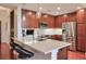 Kitchen with stainless steel appliances, white countertops, and wood cabinets at 3300 Windy Ridge Se Pkwy # 612, Atlanta, GA 30339
