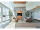 Comfortable lobby area with stylish seating, a stone feature wall with built-in TV and natural light at 3300 Windy Ridge Se Pkwy # 612, Atlanta, GA 30339