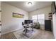 Functional bedroom featuring neutral carpet and large window, perfect for work or study at 2461 Bayrose Cir, Atlanta, GA 30344