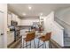 Inviting kitchen area featuring a large island, stainless steel appliances, and white cabinets at 2461 Bayrose Cir, Atlanta, GA 30344