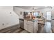 Beautiful kitchen island with granite countertops and stainless steel dishwasher open to the living area at 2461 Bayrose Cir, Atlanta, GA 30344