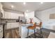 Charming kitchen featuring granite countertops, stainless steel appliances, and a large island with barstool seating at 2461 Bayrose Cir, Atlanta, GA 30344