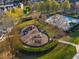 Aerial view of the community playground with slides, swings, and climbing structures, ideal for Gathering fun at 2461 Bayrose Cir, Atlanta, GA 30344