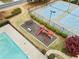 Aerial view of playground and tennis courts bordered with green foliage at 3227 Grove Trl, Acworth, GA 30101