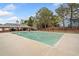 Community pool with a large basin of water and a club house on the far end at 3227 Grove Trl, Acworth, GA 30101