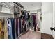 Organized walk-in closet with ample shelving and hanging space for clothing and accessories at 3628 Silvery Way, Powder Springs, GA 30127