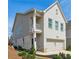 Charming exterior view of a two-story home with a brick facade and attached garage at 3628 Silvery Way, Powder Springs, GA 30127