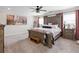 Well-lit main bedroom featuring a decorative bed, neutral tones, and an elegant ambiance at 3628 Silvery Way, Powder Springs, GA 30127
