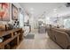 Bright and spacious open concept living area connecting the kitchen, dining, and living spaces at 3628 Silvery Way, Powder Springs, GA 30127