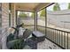 Cozy screened porch with seating and a view of the landscaped backyard at 3628 Silvery Way, Powder Springs, GA 30127