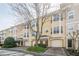 Charming street featuring attractive townhomes with brick driveways and garages at 375 Highland Ne Ave # 903, Atlanta, GA 30312