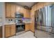 Updated kitchen featuring stainless steel appliances and light wood cabinets at 375 Highland Ne Ave # 903, Atlanta, GA 30312