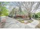 Attractive residential street with lush trees leading to the Highland community at 375 Highland Ne Ave # 903, Atlanta, GA 30312