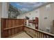 A wooden balcony overlooks the community at 5364 Hickory Knl, Norcross, GA 30071