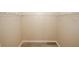 Walk-in closet with shelving and wood-look flooring provides ample storage space at 5364 Hickory Knl, Norcross, GA 30071