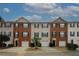Charming townhome featuring brick accents, and private garage at 5364 Hickory Knl, Norcross, GA 30071