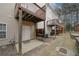 Exterior view of back of property with door and patio at 5364 Hickory Knl, Norcross, GA 30071