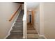 The hallway features carpeted stairs and hardwood flooring at 5364 Hickory Knl, Norcross, GA 30071
