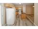 Neutral kitchen offers wood cabinets, white appliances, and center island at 5364 Hickory Knl, Norcross, GA 30071
