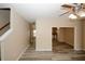 Open-concept living area with wood-look floors, recessed lighting and neutral wall color at 5364 Hickory Knl, Norcross, GA 30071