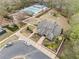 Aerial view of the clubhouse, pool, and playground, highlighting community amenities at 940 Magnolia Blossom Ct, Alpharetta, GA 30005