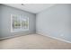 Bedroom with large window offers plenty of natural light at 940 Magnolia Blossom Ct, Alpharetta, GA 30005