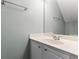 Well-lit bathroom boasts a modern vanity and a large framed mirror at 1730 Stanwood Nw Dr, Kennesaw, GA 30152