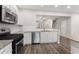 Well-lit kitchen featuring stainless steel appliances, granite countertops, and modern cabinetry at 1730 Stanwood Nw Dr, Kennesaw, GA 30152
