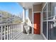 Comfortable balcony space with railing overlooking a parking lot and a nearby apartment complex at 4333 Dunwoody Park # 1211, Atlanta, GA 30338