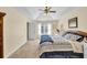 Welcoming bedroom featuring plush carpeting, natural light, and serene decor for comfortable and peaceful living at 735 Ambur Cove Way Nw, Lawrenceville, GA 30043