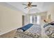 Cozy bedroom features carpet, natural light, and decor providing a comfortable and inviting space to unwind at 735 Ambur Cove Way Nw, Lawrenceville, GA 30043