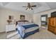 Comfortable main bedroom features a trey ceiling, carpet and generous natural light, for relaxation and rest at 735 Ambur Cove Way Nw, Lawrenceville, GA 30043