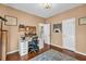 Functional office space features a desk, chair, and storage solutions, perfect for remote work and studying at 735 Ambur Cove Way Nw, Lawrenceville, GA 30043