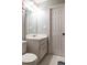 Cozy bathroom featuring a white vanity and tiled flooring, exuding a clean and inviting atmosphere at 103 New Hood Rd, Stockbridge, GA 30281