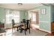 Cozy dining area featuring traditional furniture and natural light, perfect for Gathering meals at 103 New Hood Rd, Stockbridge, GA 30281