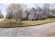 Charming single-Gathering home featuring a manicured lawn and inviting curb appeal at 103 New Hood Rd, Stockbridge, GA 30281