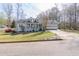 Charming single-story home with a welcoming front porch, well-manicured lawn, and attached garage at 103 New Hood Rd, Stockbridge, GA 30281
