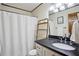 Bathroom features a modern sink and vanity, along with a shower and tub at 3141 Branford Ct, Marietta, GA 30062