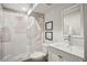Updated bathroom with a stylish shower curtain and modern vanity at 3141 Branford Ct, Marietta, GA 30062