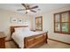 Comfortable bedroom with wood-framed windows, wood trim and carpeted floors at 3141 Branford Ct, Marietta, GA 30062